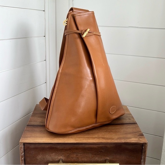Longchamp Handbags - ISO Longchamp Roseau sling bag in brown